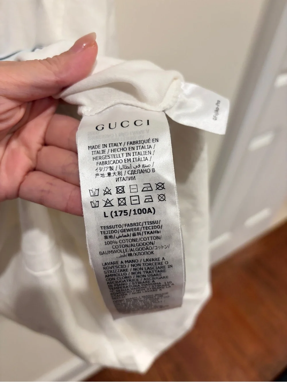 Gucci White Tee with Blue Logo and Doraemon Graphic
